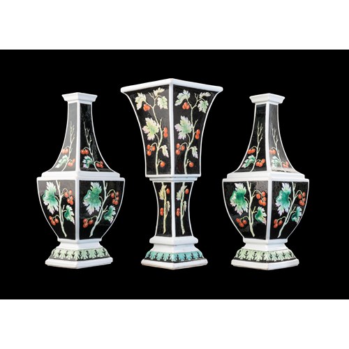 Rare Chinese porcelain garniture of Bottle Vases with black ground from the 'Pronk workshop'